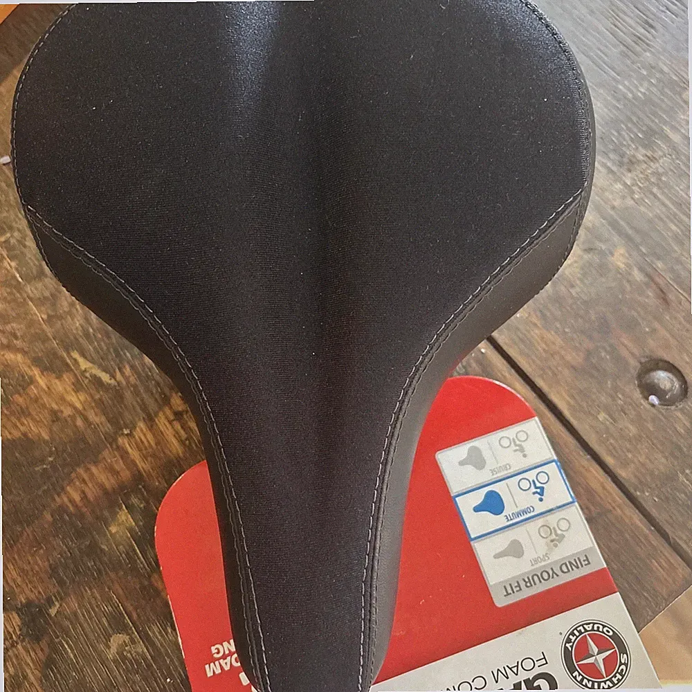 Schwinn Gateway Foam Comfort Bicycle Seat Mid-Width Black w/ Tag shows wear